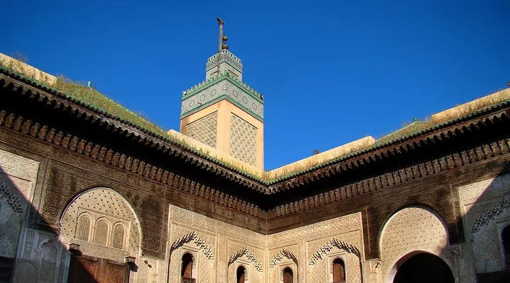 The courtyard and minaret of Bou Inania Madrasa in Fès.